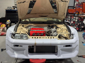Printed CR-X front bumper fitted below the twin-turbo J-series engine bay
