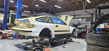 Side of the CR-X on stands with the printed front and rear fenders fitted